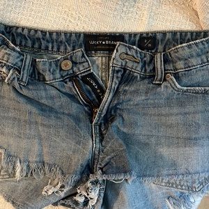 Distressed denim shorts